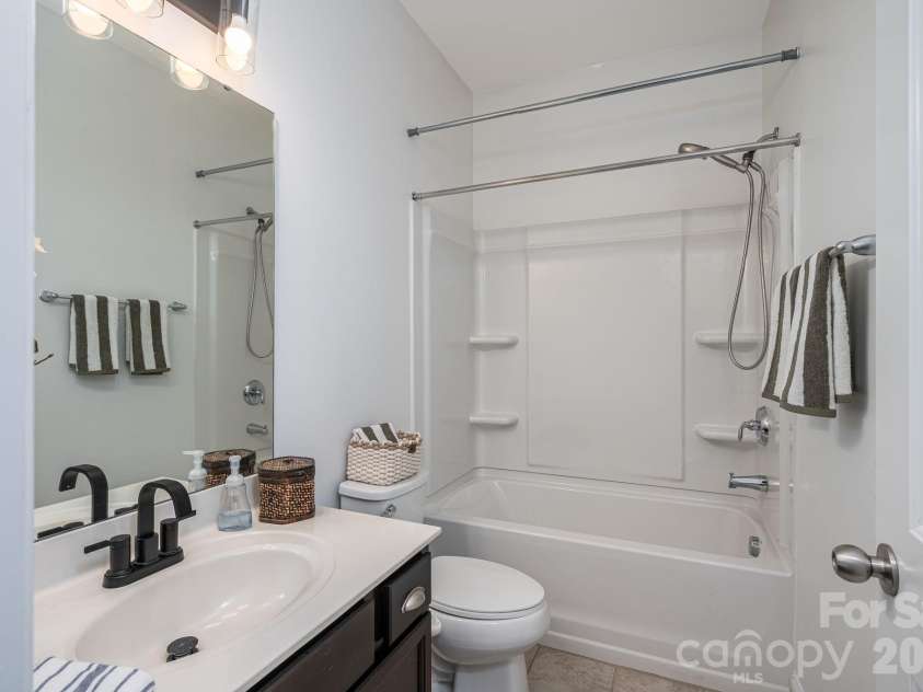 227 Bay Shore Drive, Belmont, NC 28012.  MLS# CAR4380360, YatesRealty ID 29185. Main level bathroom.