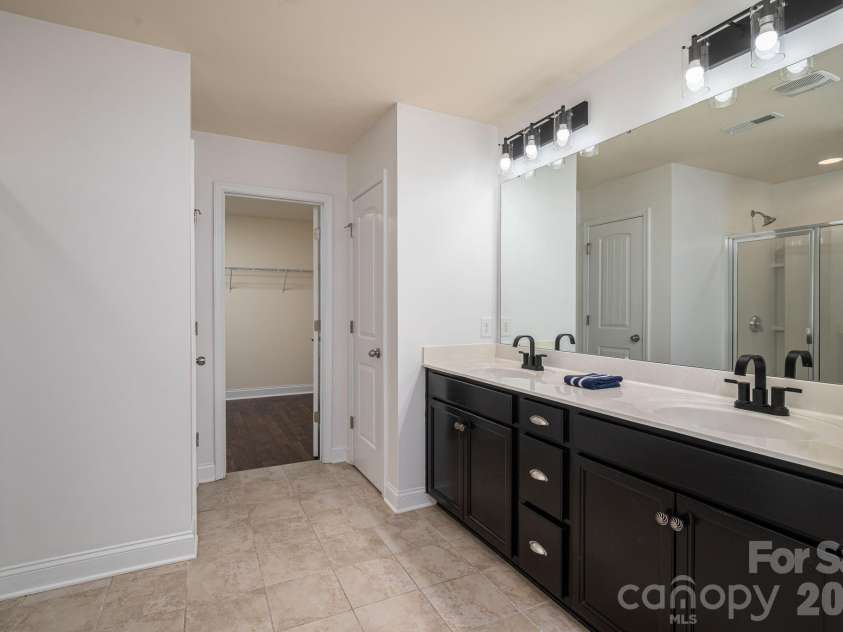 227 Bay Shore Drive, Belmont, NC 28012.  MLS# CAR4380360, YatesRealty ID 29185. Primary ensuite.