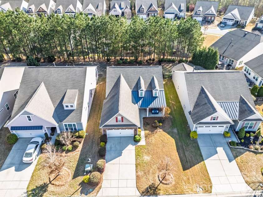1016 Wells Lane, Fort Mill, SC 29707.  MLS# CAR4359886, YatesRealty ID 29188. Arial view showing the wooded, private back tard!
