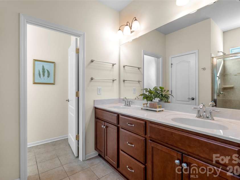 1016 Wells Lane, Fort Mill, SC 29707.  MLS# CAR4359886, YatesRealty ID 29188. Double sink vanity, W/Water closet!