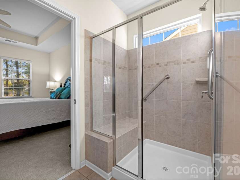 1016 Wells Lane, Fort Mill, SC 29707.  MLS# CAR4359886, YatesRealty ID 29188. Oversized Shower w/ built in seat!