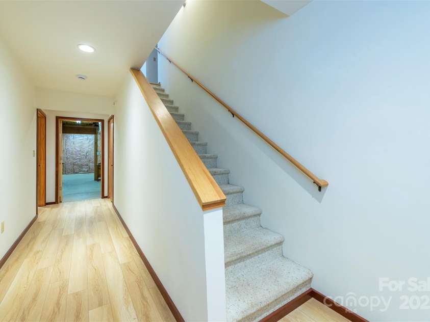 7 Winding Poplar Road, Black Mountain, NC 28711.  MLS# CAR4285345, YatesRealty ID 29194. Downstairs/Basement