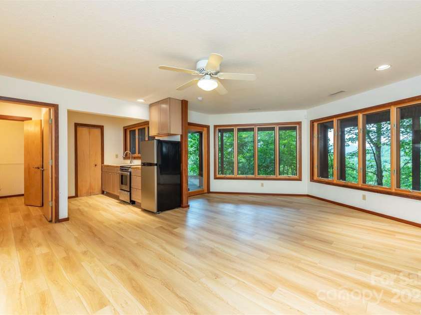 7 Winding Poplar Road, Black Mountain, NC 28711.  MLS# CAR4285345, YatesRealty ID 29194. Finished area includes a large bedroom/living area, new kitchenette, and Full BA.