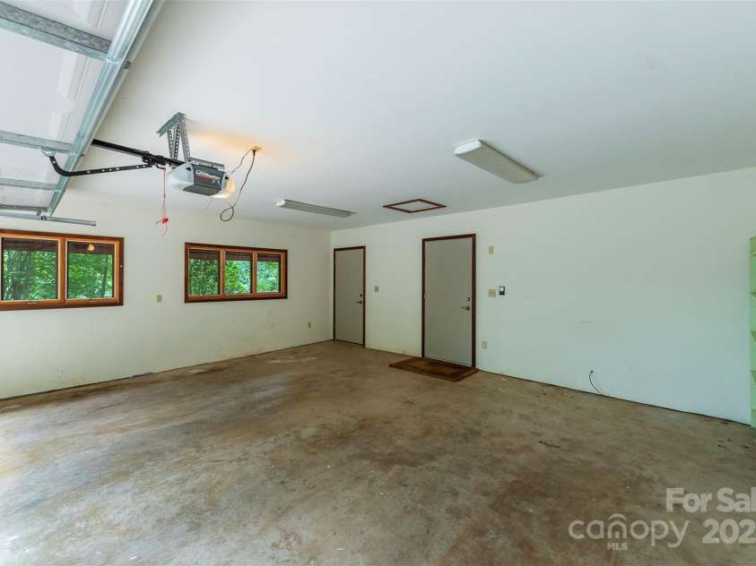 7 Winding Poplar Road, Black Mountain, NC 28711.  MLS# CAR4285345, YatesRealty ID 29194. Two car Garage