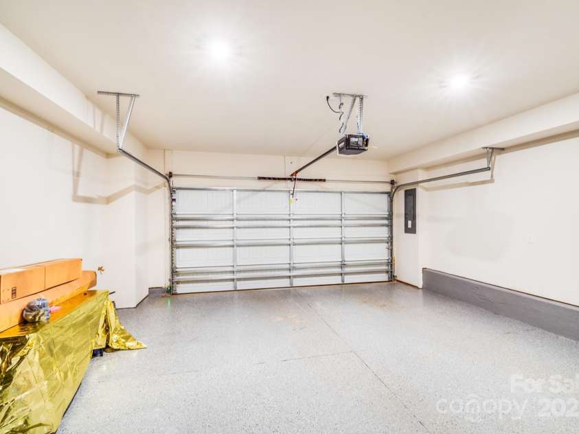 3738 Memorial Parkway, Charlotte, NC 28278.  MLS# CAR4276646, YatesRealty ID 29195. Rearload 2 Car Garage Epoxy Floor