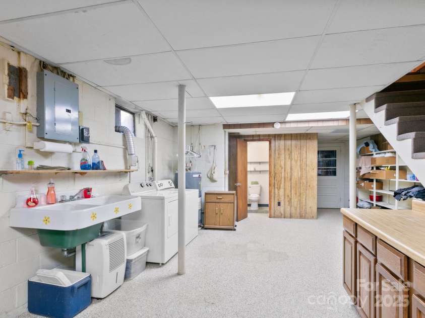 11 Aloha Circle, Candler, NC 28715.  MLS# CAR4313548, YatesRealty ID 292. Laundry area 