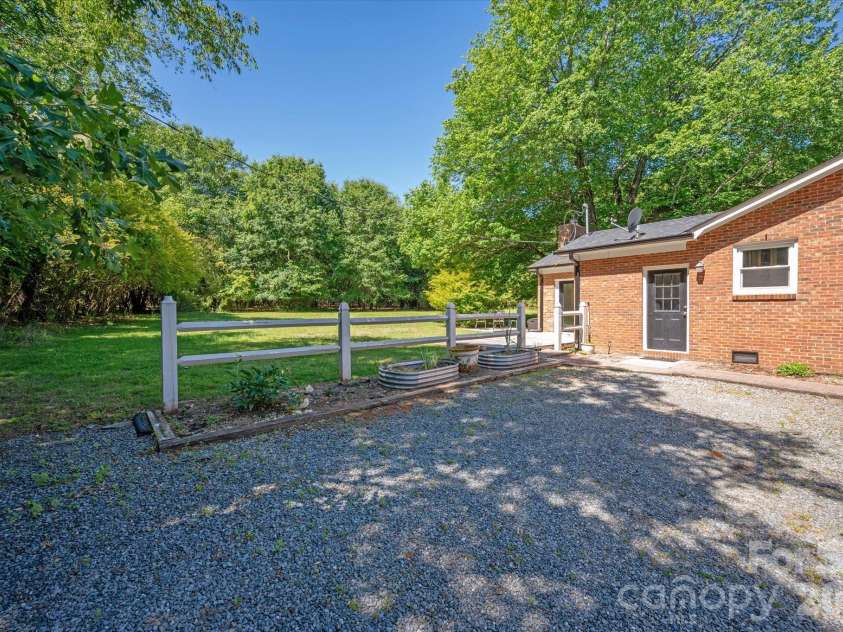 2645 Walker Road, Matthews, NC 28105.  MLS# CAR4382733, YatesRealty ID 29208. 