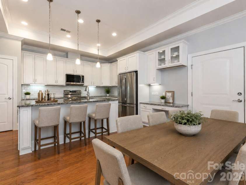 4534 Ideal Way, Harrisburg, NC 28075.  MLS# CAR4377645, YatesRealty ID 29209. Virtually staged kitchen and dining area