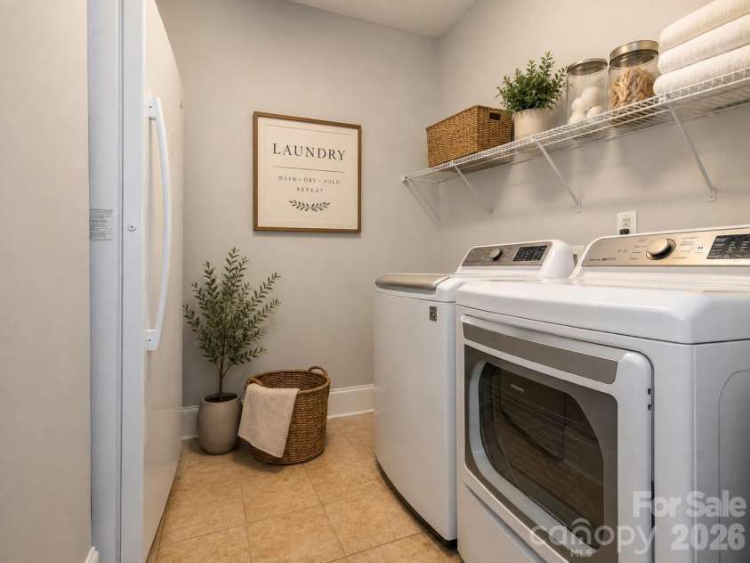 4534 Ideal Way, Harrisburg, NC 28075.  MLS# CAR4377645, YatesRealty ID 29209. Virtually staged laundry room