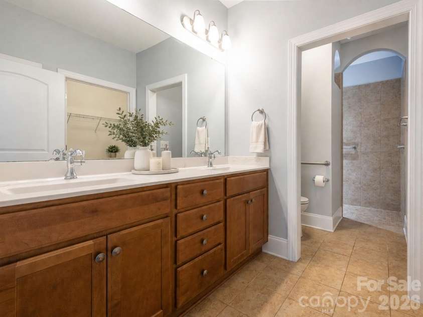 4534 Ideal Way, Harrisburg, NC 28075.  MLS# CAR4377645, YatesRealty ID 29209. Virtually staged primary bathroom