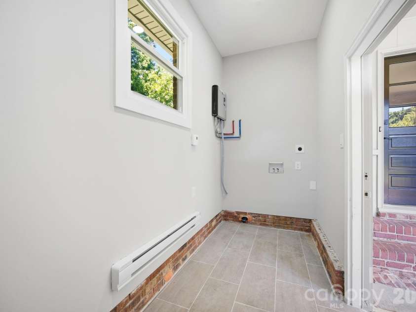 413 Mclelland Avenue, Mooresville, NC 28115.  MLS# CAR4379250, YatesRealty ID 29214. Laundry Room