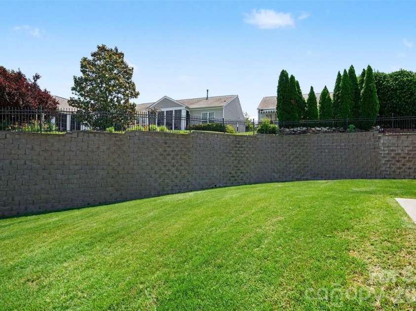 8036 Crater Lake Drive, Fort Mill, SC 29707.  MLS# CAR4390764, YatesRealty ID 29219. Backyard