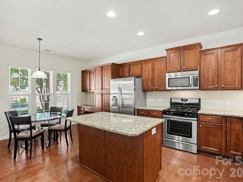 8036 Crater Lake Drive, Fort Mill, SC 29707.  MLS# CAR4390764, YatesRealty ID 29219. Kitchen & Island
