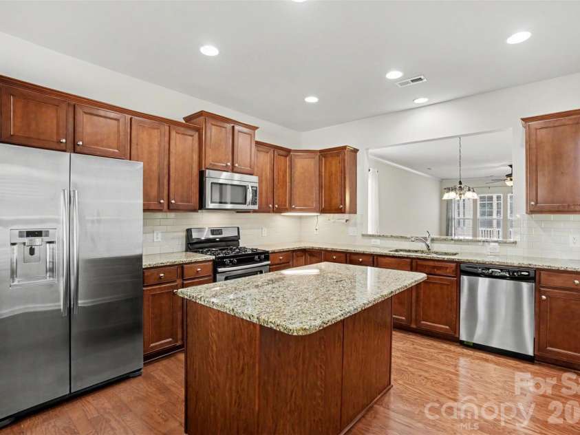 8036 Crater Lake Drive, Fort Mill, SC 29707.  MLS# CAR4390764, YatesRealty ID 29219. Kitchen & Island