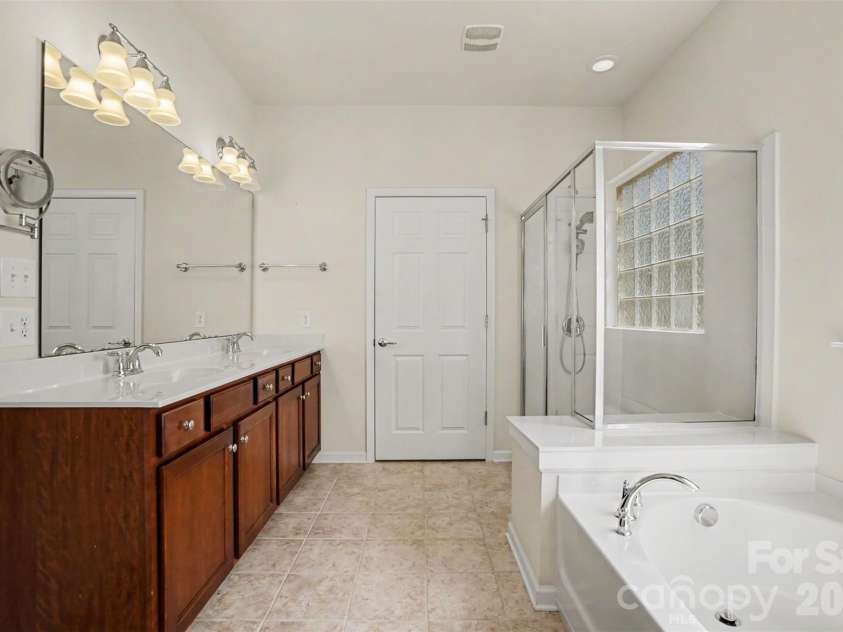 8036 Crater Lake Drive, Fort Mill, SC 29707.  MLS# CAR4390764, YatesRealty ID 29219. Primary Bath