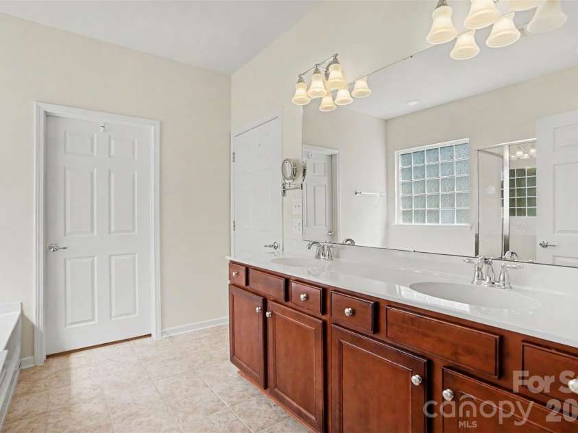 8036 Crater Lake Drive, Fort Mill, SC 29707.  MLS# CAR4390764, YatesRealty ID 29219. Primary Bath