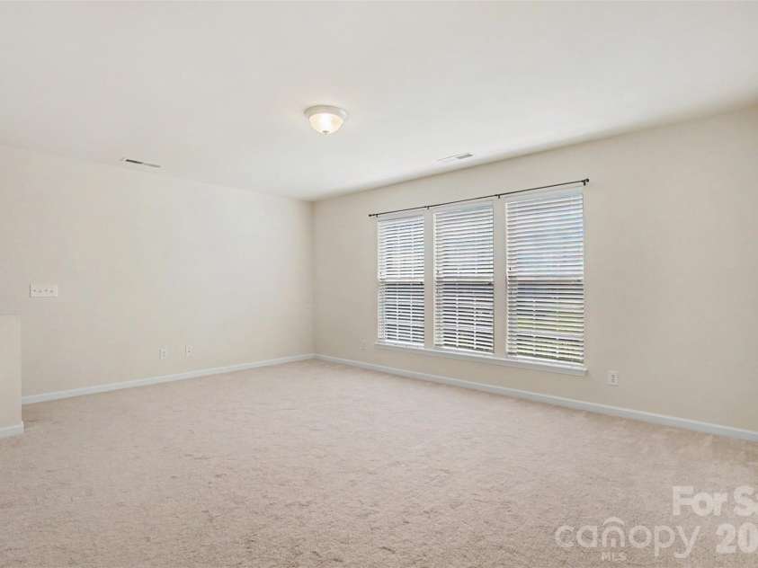 8036 Crater Lake Drive, Fort Mill, SC 29707.  MLS# CAR4390764, YatesRealty ID 29219. Spacious Loft/Bedroom