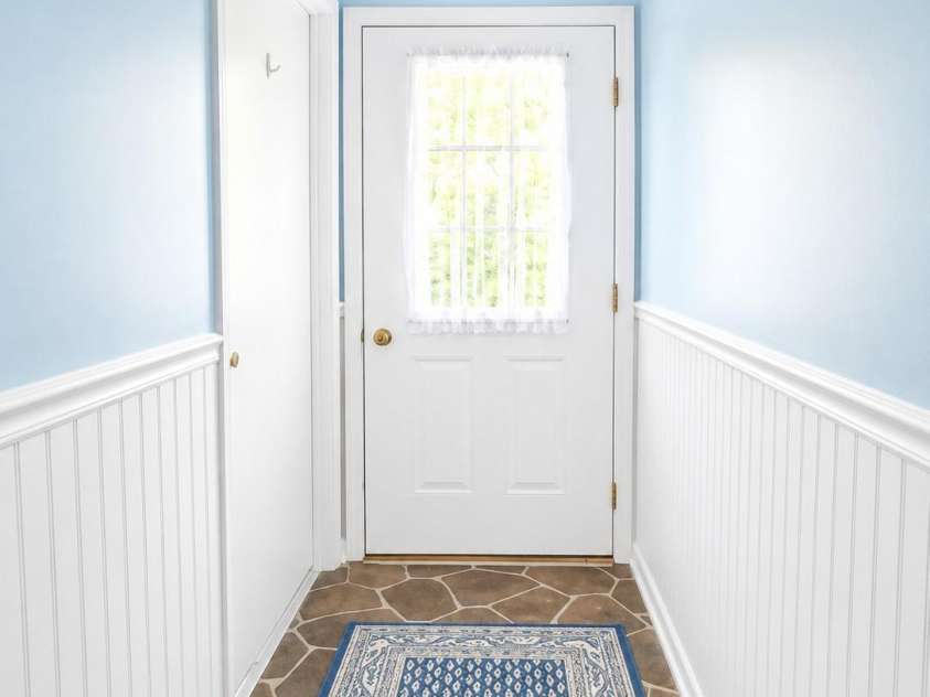 114 Falling Waters Road, Hendersonville, NC 28792.  MLS# CAR4390548, YatesRealty ID 29220. Shared entry door, hallway divides the units
