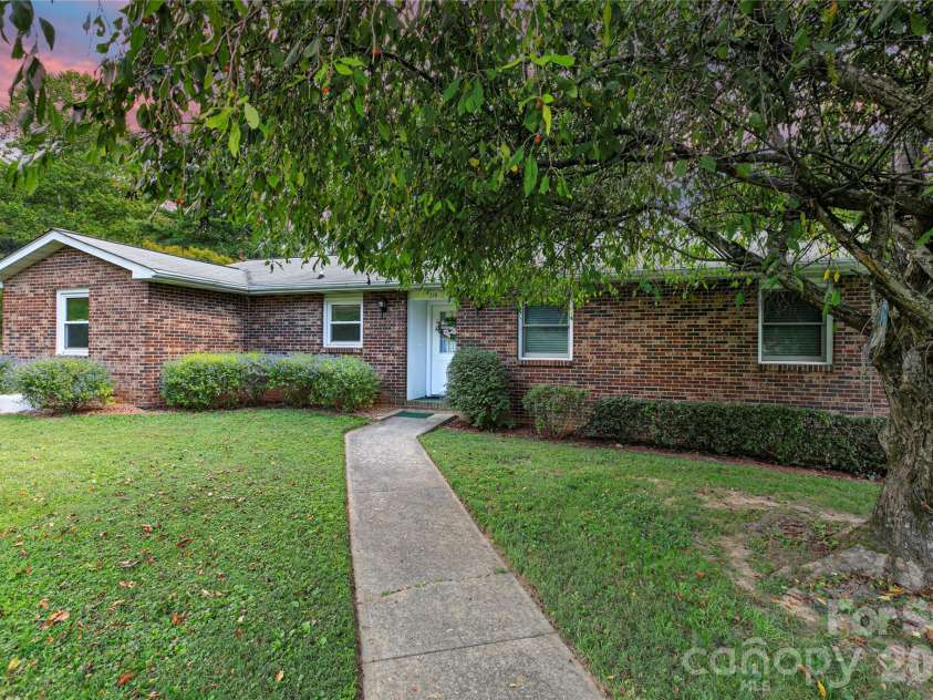 114 Falling Waters Road, Hendersonville, NC 28792.  MLS# CAR4426229, YatesRealty ID 29220. Level front yard