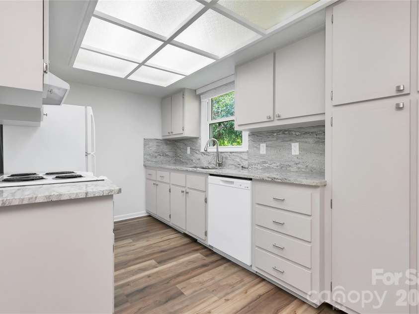 114 Falling Waters Road, Hendersonville, NC 28792.  MLS# CAR4426229, YatesRealty ID 29220. Light and Bright