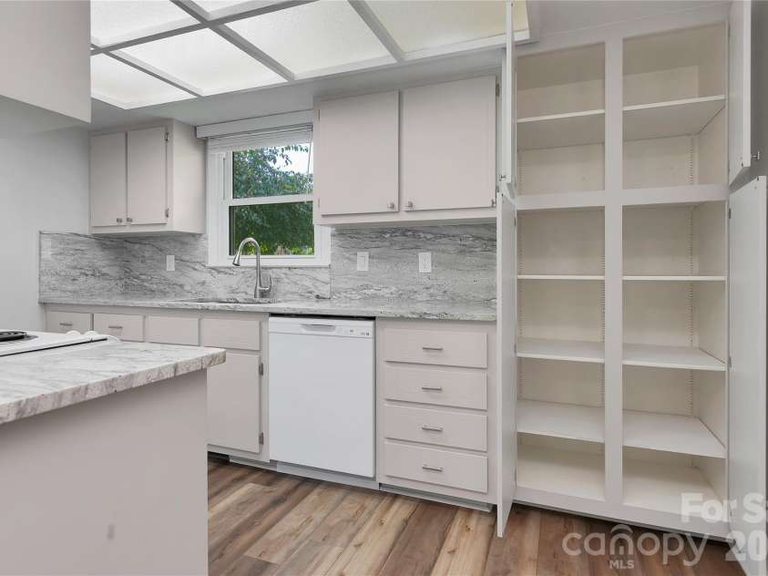114 Falling Waters Road, Hendersonville, NC 28792.  MLS# CAR4426229, YatesRealty ID 29220. Pantry storage