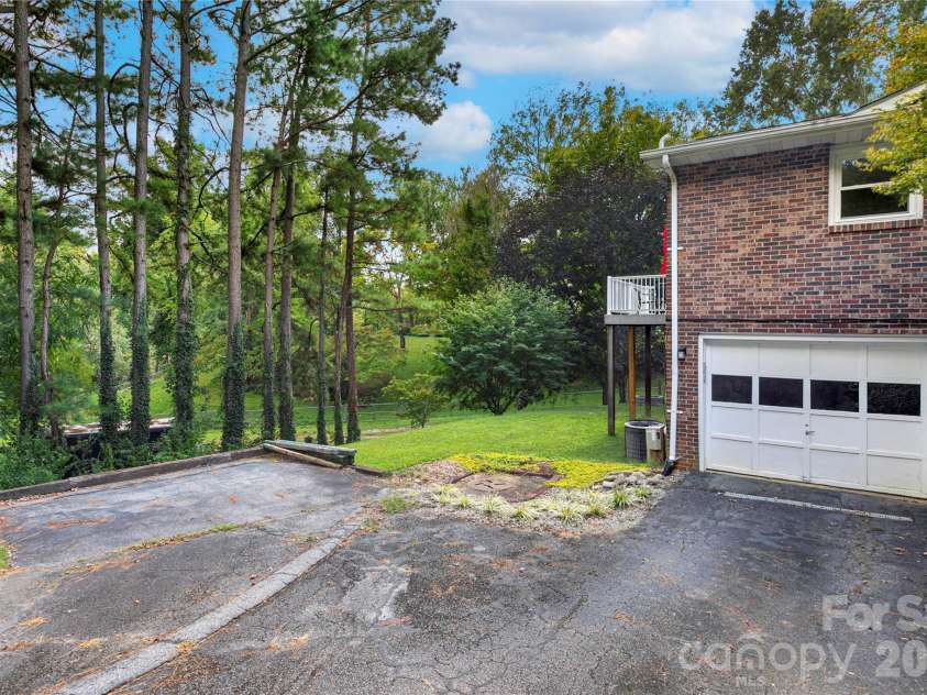 114 Falling Waters Road, Hendersonville, NC 28792.  MLS# CAR4426229, YatesRealty ID 29220. Plenty of parking