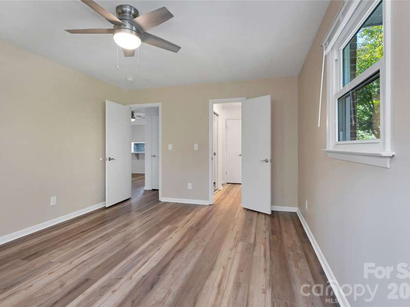114 Falling Waters Road, Hendersonville, NC 28792.  MLS# CAR4426229, YatesRealty ID 29220. Primary bedroom