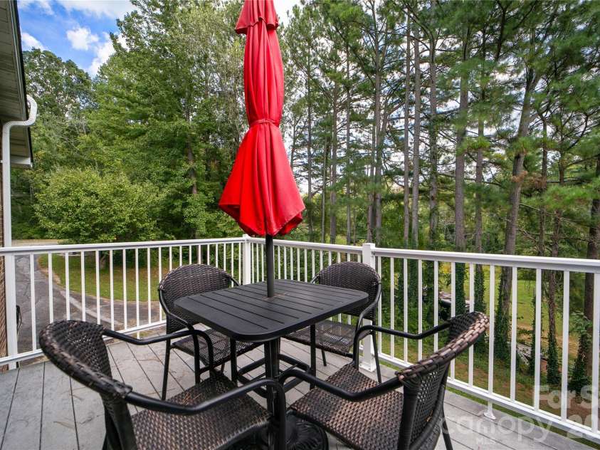 114 Falling Waters Road, Hendersonville, NC 28792.  MLS# CAR4426229, YatesRealty ID 29220. Private deck