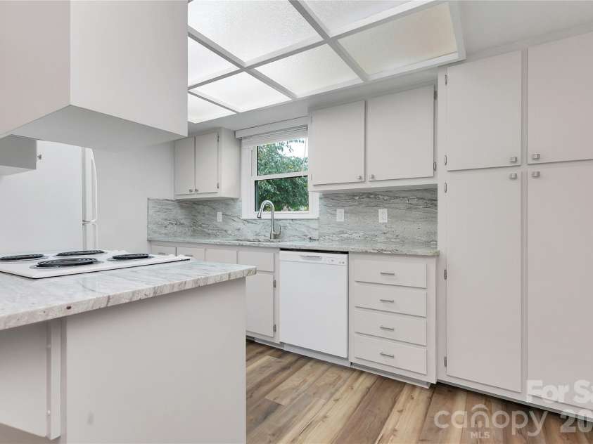 114 Falling Waters Road, Hendersonville, NC 28792.  MLS# CAR4426229, YatesRealty ID 29220. Updated kitchen