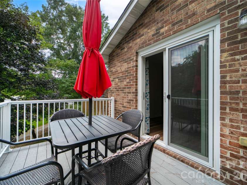 114 Falling Waters Road, Hendersonville, NC 28792.  MLS# CAR4426229, YatesRealty ID 29220. Updated with metal railing and composite decking