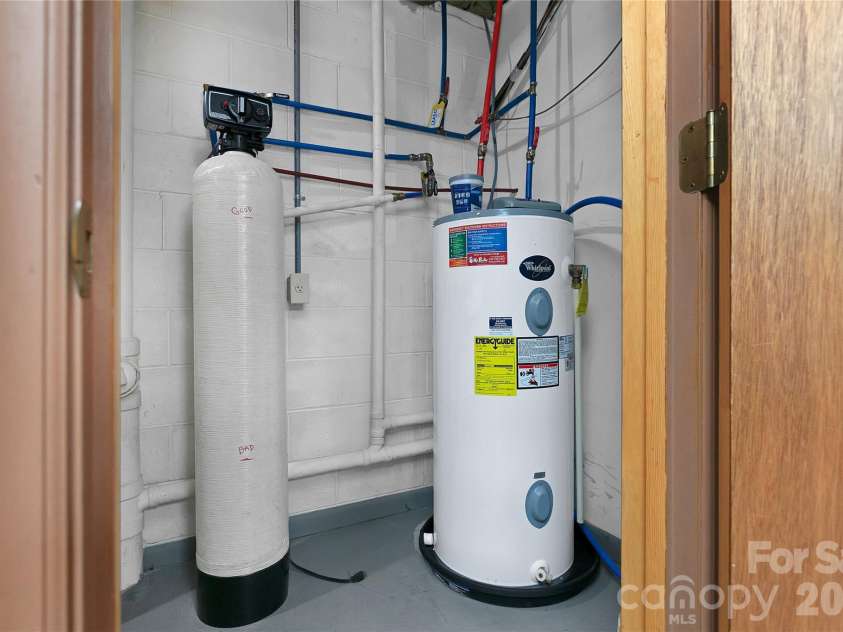 114 Falling Waters Road, Hendersonville, NC 28792.  MLS# CAR4426229, YatesRealty ID 29220. Water heater and whole house water filter