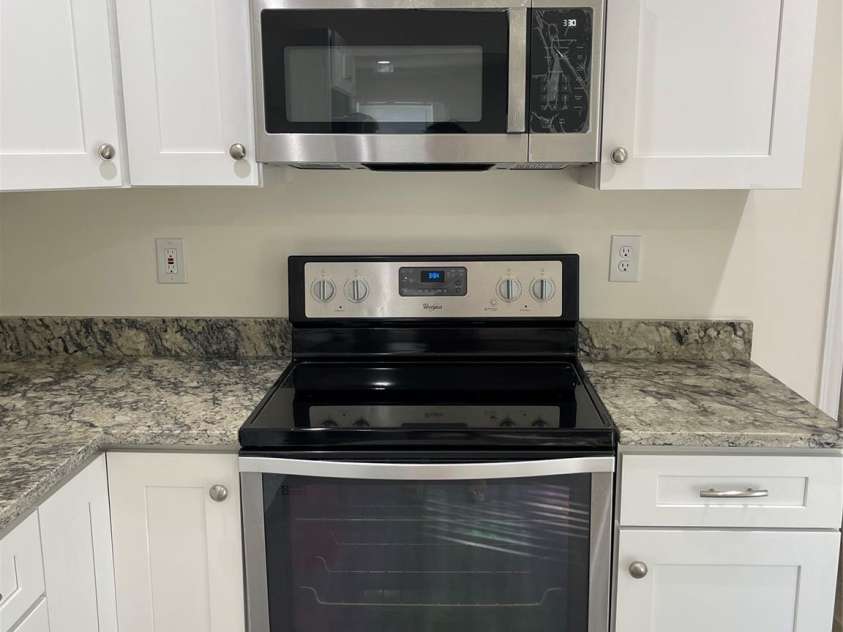 832 Sikes Avenue, Wadesboro, NC 28170.  MLS# CAR4311063, YatesRealty ID 2923. Stove & microwave