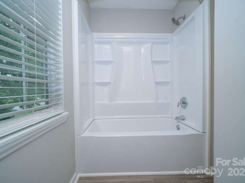8125 Sheringham Way, Charlotte, NC 28227.  MLS# CAR4261059, YatesRealty ID 29230. Hallway Bathroom