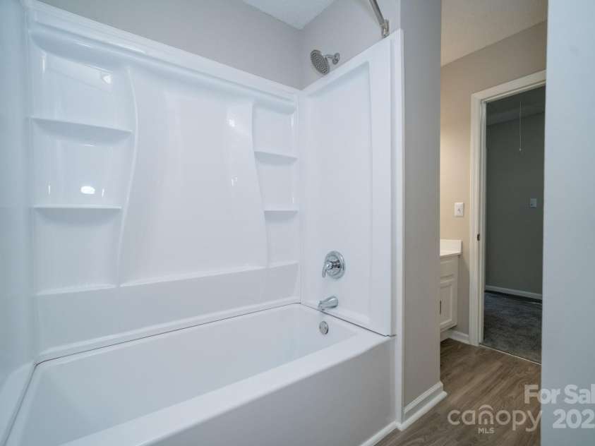 8125 Sheringham Way, Charlotte, NC 28227.  MLS# CAR4261059, YatesRealty ID 29230. Hallway Bathroom