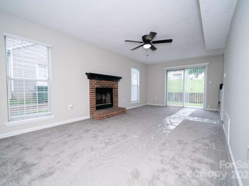 8125 Sheringham Way, Charlotte, NC 28227.  MLS# CAR4261059, YatesRealty ID 29230. Living Room