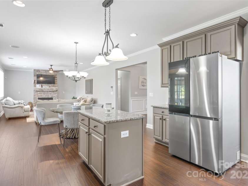 10951 Hat Creek Lane, Davidson, NC 28036.  MLS# CAR4284008, YatesRealty ID 29232. Flow effortlessly from the dining or living room