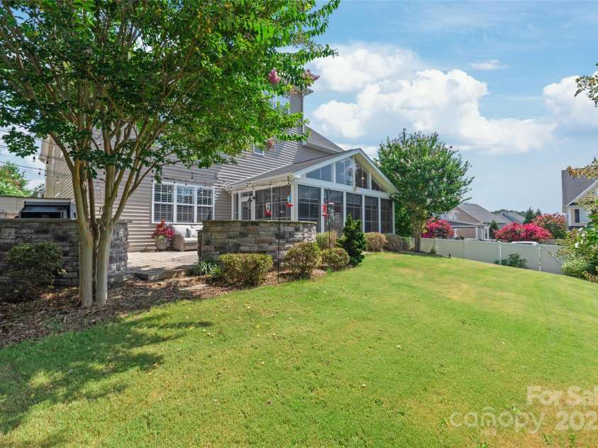 10951 Hat Creek Lane, Davidson, NC 28036.  MLS# CAR4284008, YatesRealty ID 29232. Privacy fence and mature landscaping wrap your backyard. It's your haven from the outside world