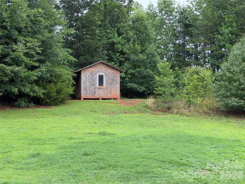 8017 Secluded Lane, Denver, NC 28037.  MLS# CAR4388285, YatesRealty ID 29235. Back shed