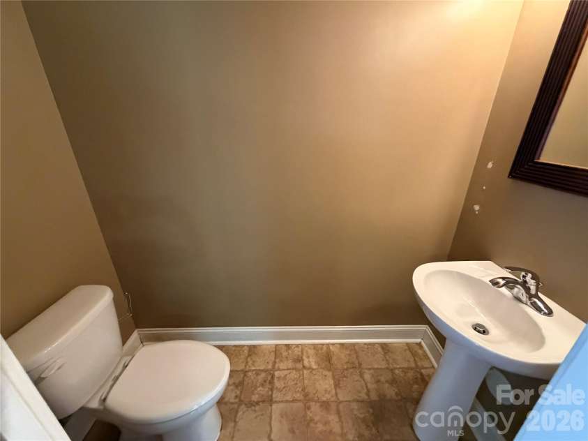 8017 Secluded Lane, Denver, NC 28037.  MLS# CAR4388285, YatesRealty ID 29235. Half bath downstairs