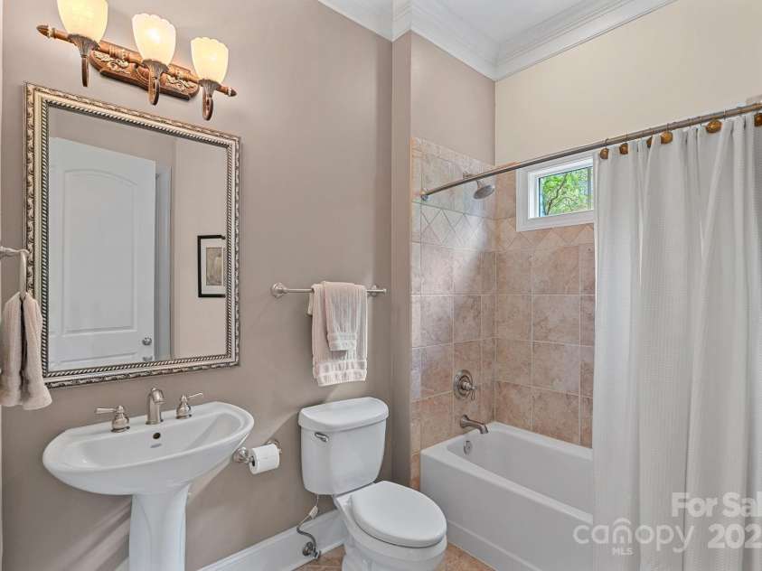1305 Anniston Place, Wesley Chapel, NC 28079.  MLS# CAR4250299, YatesRealty ID 29238. Guest bath