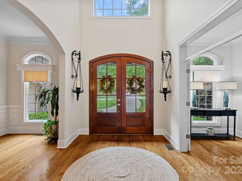 1305 Anniston Place, Wesley Chapel, NC 28079.  MLS# CAR4250299, YatesRealty ID 29238. Office and dining room off foyer