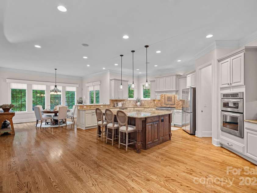 1305 Anniston Place, Wesley Chapel, NC 28079.  MLS# CAR4250299, YatesRealty ID 29238. Oversized Kitchen with XL island