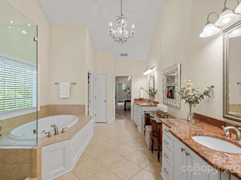 1305 Anniston Place, Wesley Chapel, NC 28079.  MLS# CAR4250299, YatesRealty ID 29238. Primary bath with dual vanities