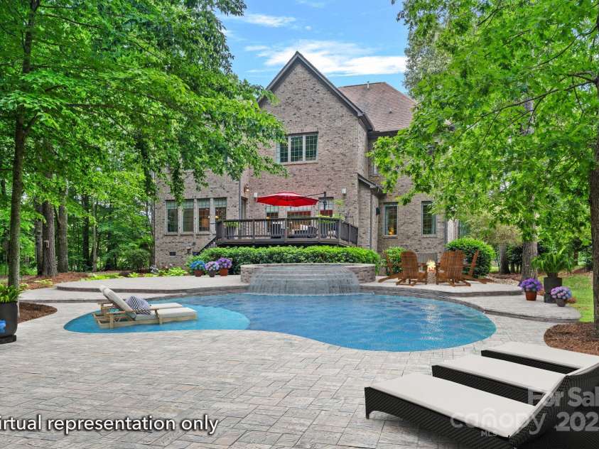 1305 Anniston Place, Wesley Chapel, NC 28079.  MLS# CAR4250299, YatesRealty ID 29238. Virtual representation of pool in backyard
