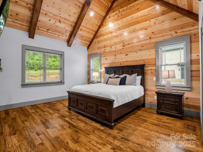 165 Kirkwood Hill Lane, Hendersonville, NC 28739.  MLS# CAR4264440, YatesRealty ID 29239. Primary suite, red oak beams, lumber cut from the property, white oak hardwood floors