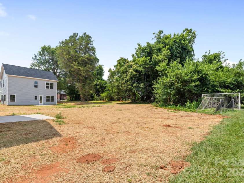 587 Hartness Road, Statesville, NC 28677.  MLS# CAR4277166, YatesRealty ID 29242. Backyard