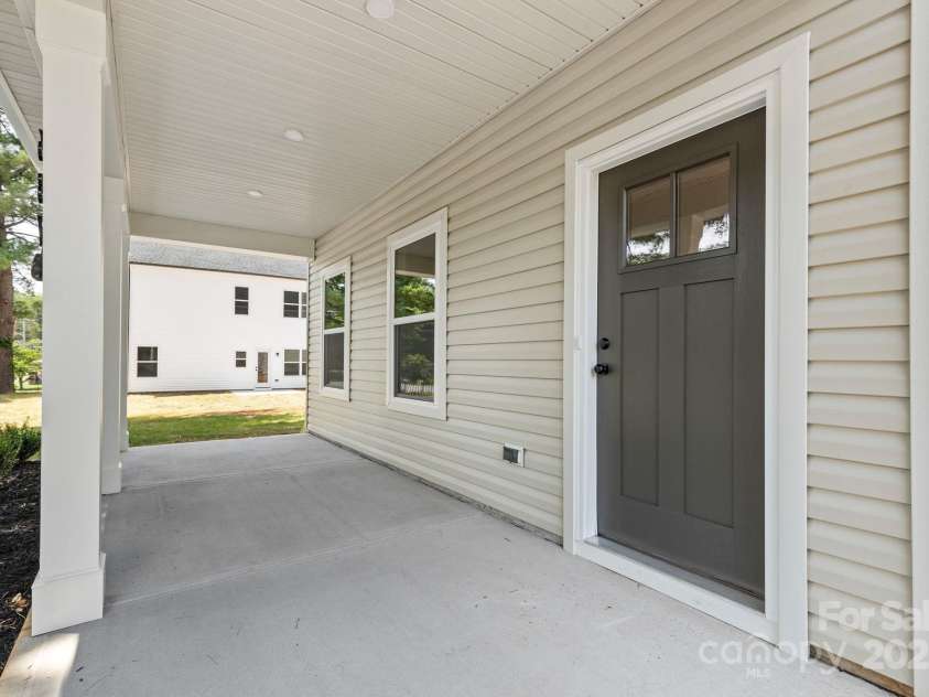 587 Hartness Road, Statesville, NC 28677.  MLS# CAR4277166, YatesRealty ID 29242. Front porch