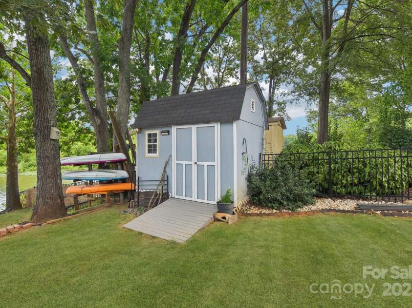 5141 Sapp Circle, Clover, SC 29710.  MLS# CAR4282509, YatesRealty ID 29244. Storage shed for lake toys and garden gear.