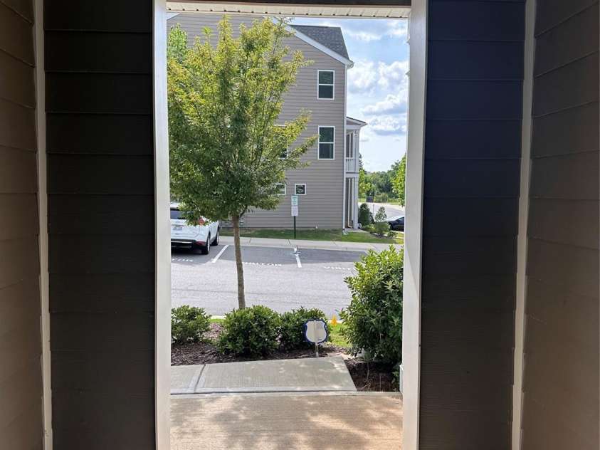 10207 Glenmere Creek Circle, Charlotte, NC 28262.  MLS# CAR4284626, YatesRealty ID 29245. Front door