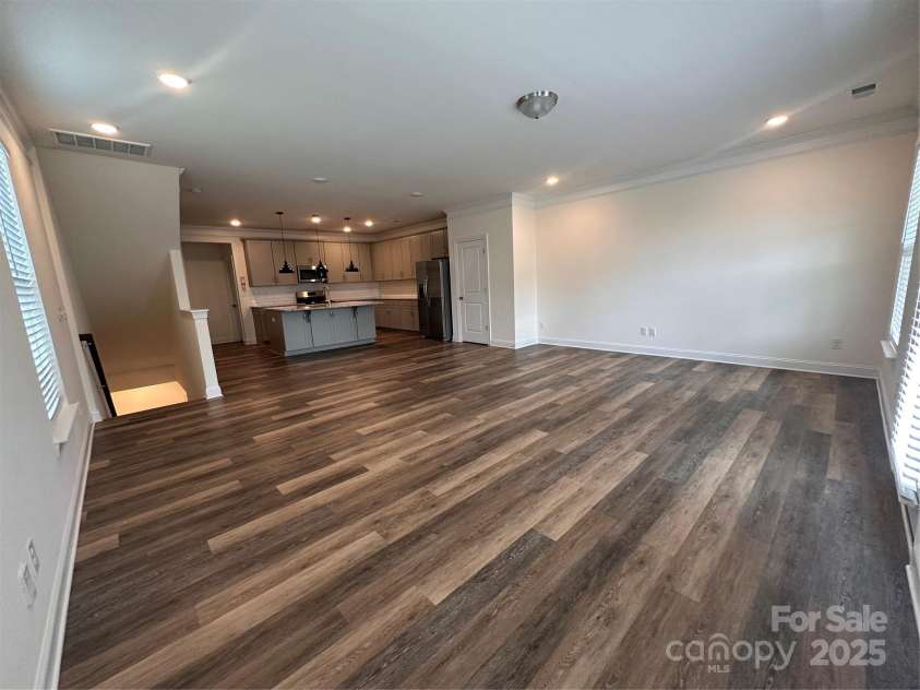 10207 Glenmere Creek Circle, Charlotte, NC 28262.  MLS# CAR4284626, YatesRealty ID 29245. Living room